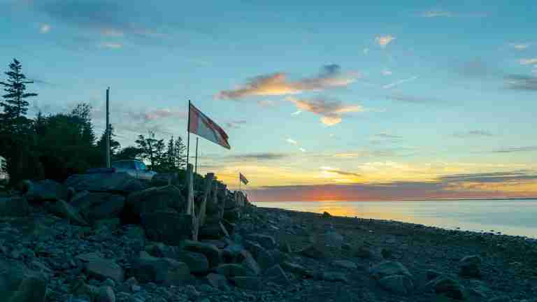 Sunset at Donnellan's Brook on the North Mountain. Canada and Nova Scotia flags proudly displayed.